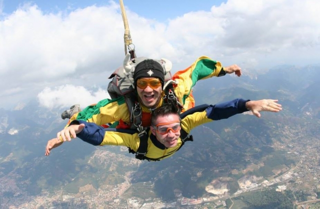  You jump together with an instructor